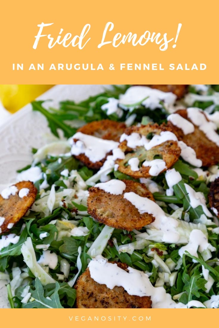 An arugula and fennel salad with creamy lemon dressing, topped with delicious fried lemons! #vegan #friedlemons #salad