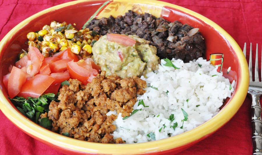 Vegan Burrito Bowl! This is better than anything you'll get in a fast food restaurant. It's fresh, homemade, healthy, and delicious. Go to www.veganosity.com to get the recipe.
