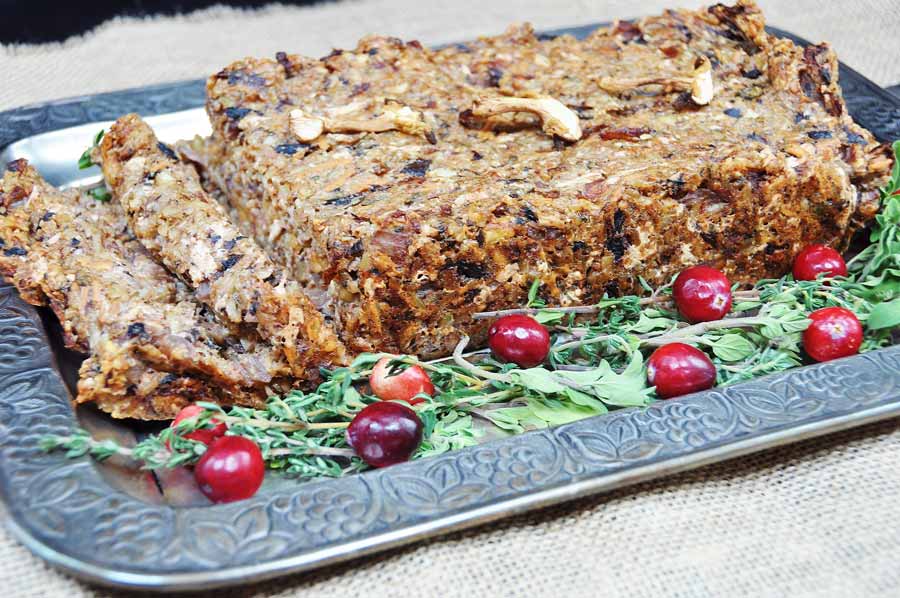 Vegan Walnut and Almond Loaf! This high protein, delicious nut loaf recipe is easy to make and the perfect centerpiece for your holiday dinner. My husband and kids love this and ask me to make it throughout the year. www.veganosity.com