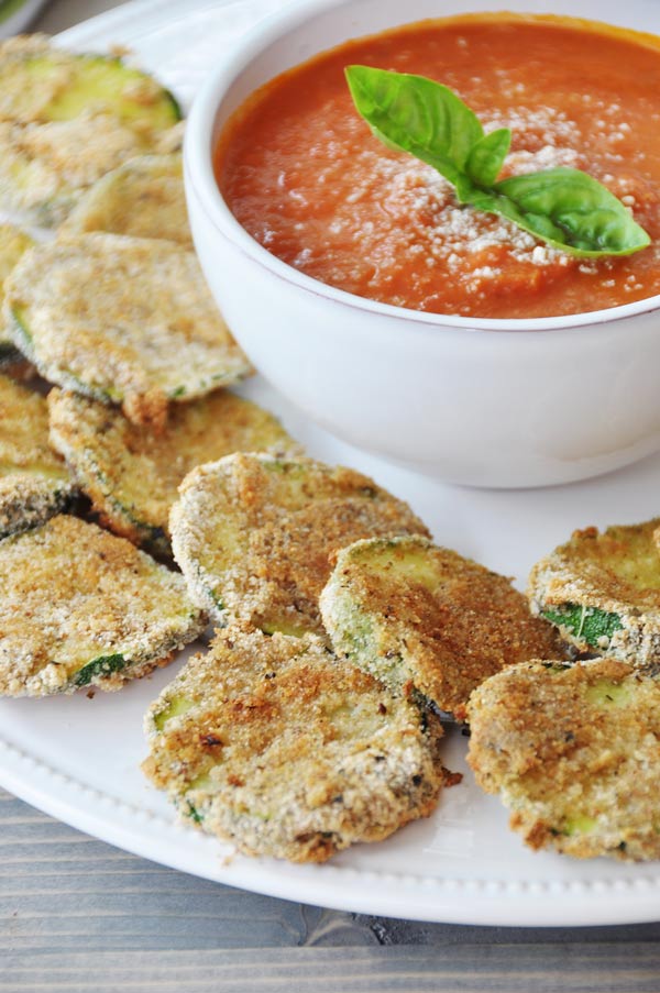 Oven Fried Parmesan Zucchini Crisps! They're crispy, crunchy, and delicious. They're also vegan! The perfect appetizer recipe. www.veganosity.com