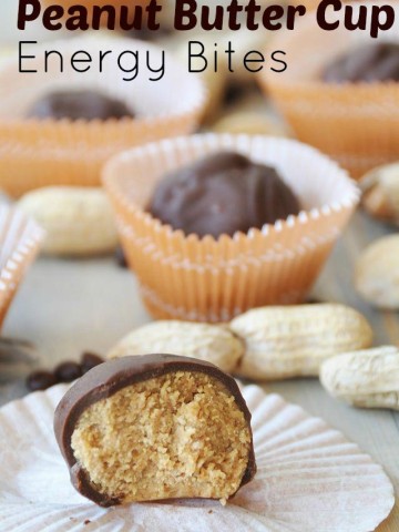 Peanut butter cup energy bites with a bite taken out of the front one.