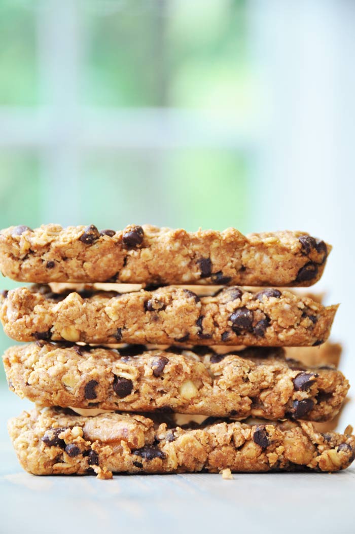 Granola bars stacked on a white surface