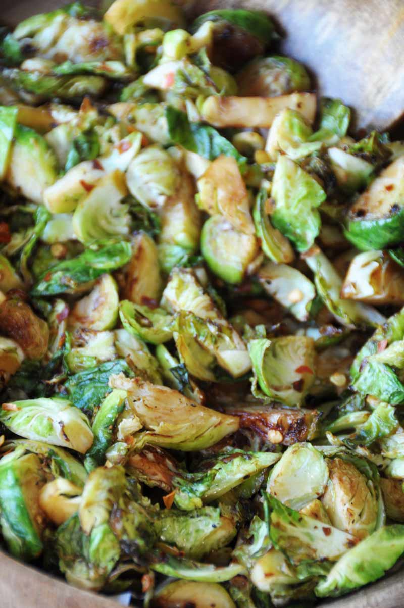 Spicy Stir-Fried Brussels Sprouts! This crisp, spicy, slightly sweet and tangy Brussels sprouts recipe will become on of your favorites. Perfect for your holiday meal! www.veganosity.com