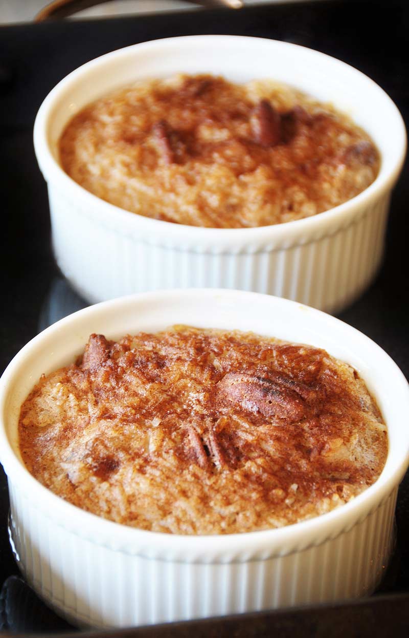 Vegan NOG Rice Pudding! This vegan nog rice pudding recipe is made with Silk Nog, savory spices, bananas, and dates. It's the perfect Christmas morning breakfast. Easy, healthy, and DELICIOUS! Egg and dairy free! www.veganosity.com