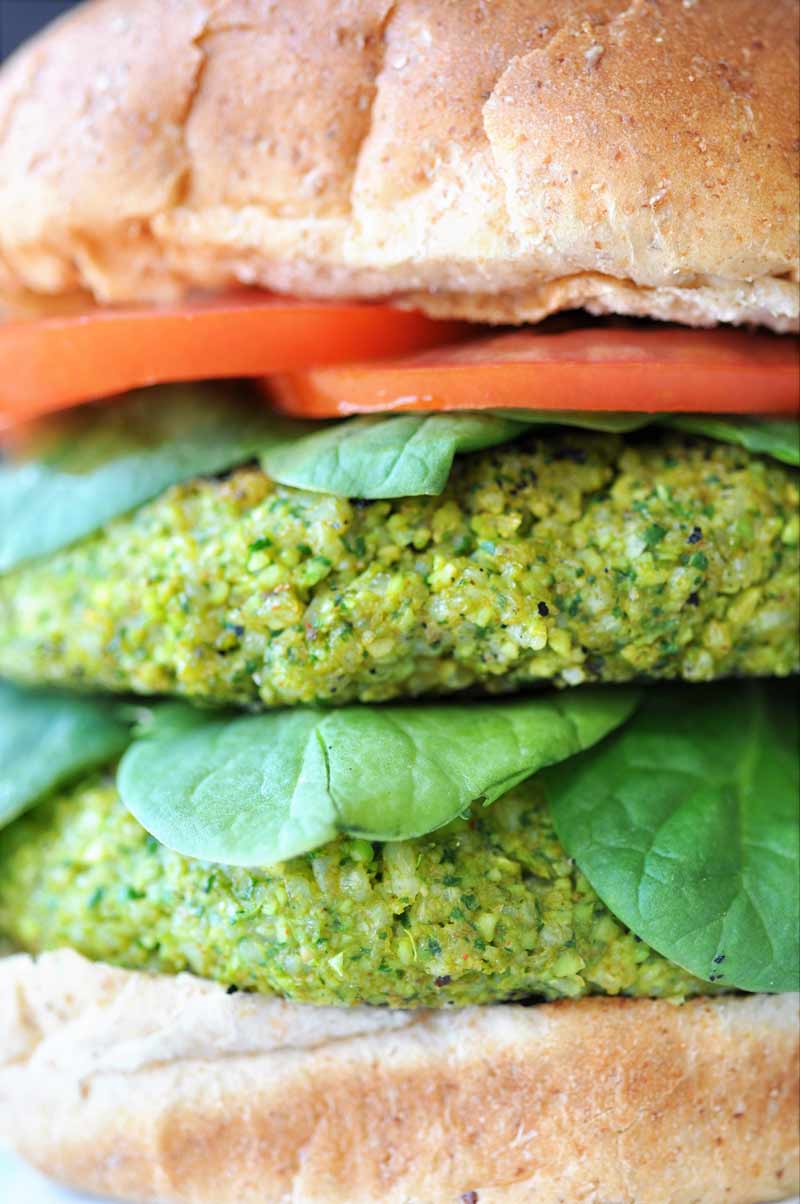 Edamame Rice Burger! This delicious edamame burger recipe is made with edamame, spinach, rice, and savory and smoky spices. Serve it on a bun, as a patty with sriracha, or dip it in soy sauce. You'll LOVE it! www.veganosity.com