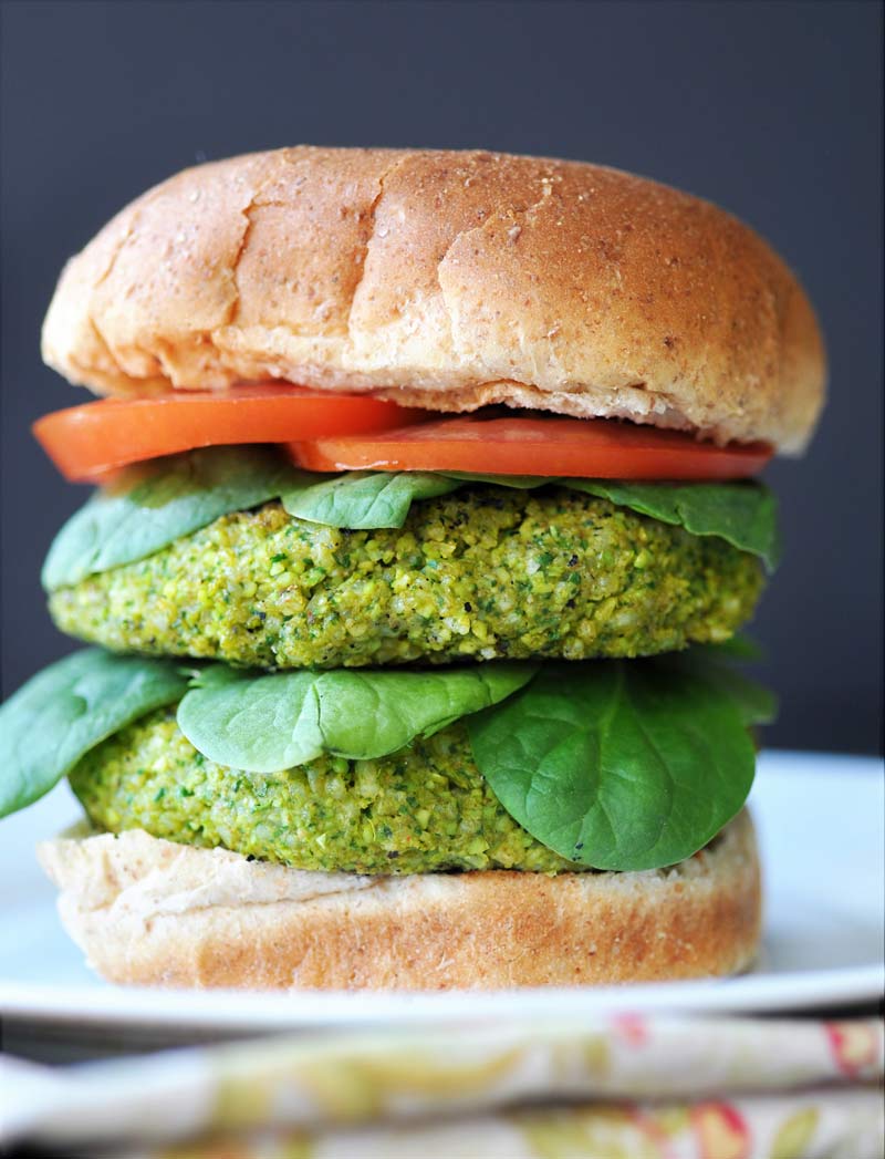 Edamame Rice Burger! This delicious edamame burger recipe is made with edamame, spinach, rice, and savory and smoky spices. Serve it on a bun, as a patty with sriracha, or dip it in soy sauce. You'll LOVE it! www.veganosity.com