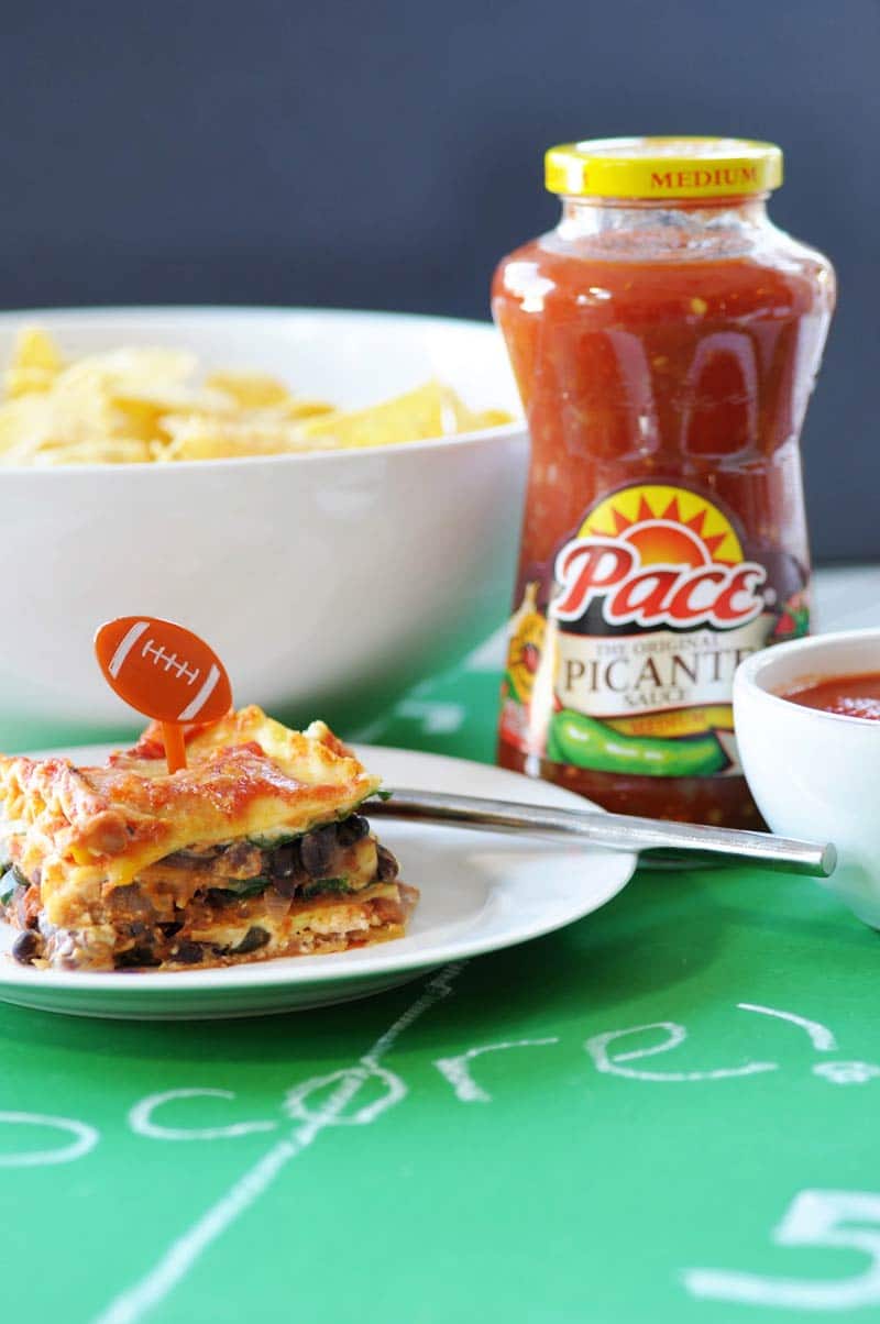 Vegan Mexican Lasagna! #KickUpTheFlavor with Pace Picante Sauce. This lasagna recipe is filled with spicy Mexican ingredients that are perfect for game day or any party with a hungry crowd. www.veganosity.com #ad