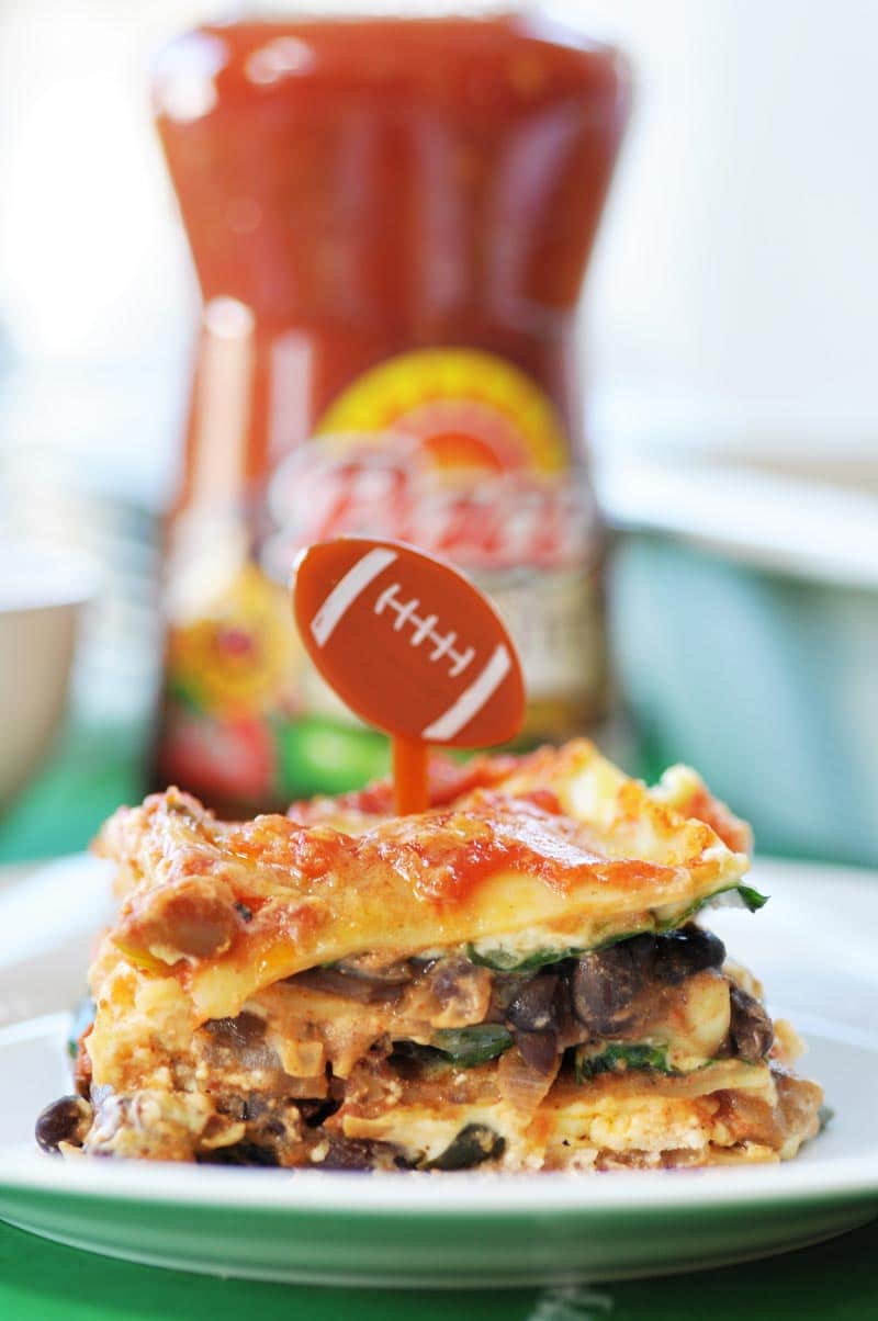 Vegan Mexican Lasagna! #KickUpTheFlavor with Pace Picante Sauce. This lasagna recipe is filled with spicy Mexican ingredients that are perfect for game day or any party with a hungry crowd. www.veganosity.com #ad