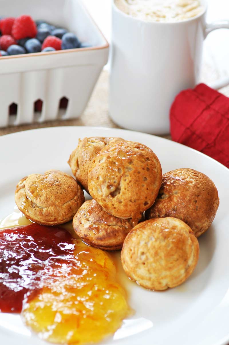 Æbelskivers - Filled Pancake Balls! This Danish filled pancake recipe is vegan and dairy-free. Light, fluffy, and delicious. Fill them with fruit, chocolate, nuts, or whatever you like. www.veganosity.com 