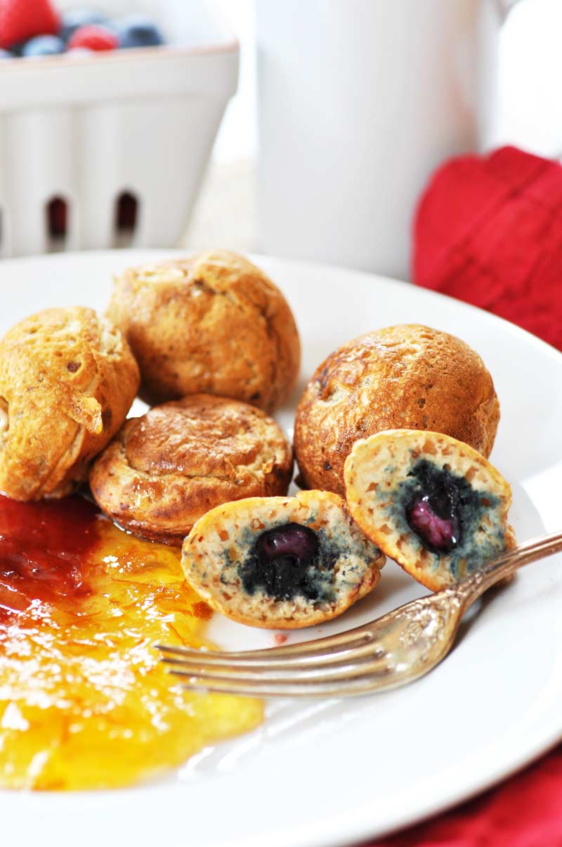 Æbelskivers - Filled Pancake Balls! This Danish filled pancake recipe is vegan and dairy-free. Light, fluffy, and delicious. Fill them with fruit, chocolate, nuts, or whatever you like. www.veganosity.com 