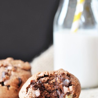 Chunky Monkey Chocolate Banana Muffins! This vegan muffin recipe is filled with chocolate and bananas. The perfect morning or afternoon treat. www.veganosity.com