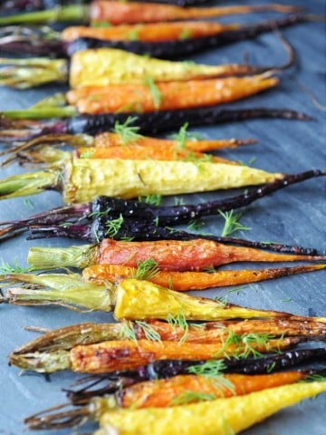 Roasted Tri-Color Baby Carrots with Dill! This recipe is for those who love tender and savory baby carrots with the fresh taste of dill. Easy, fast, and delicious