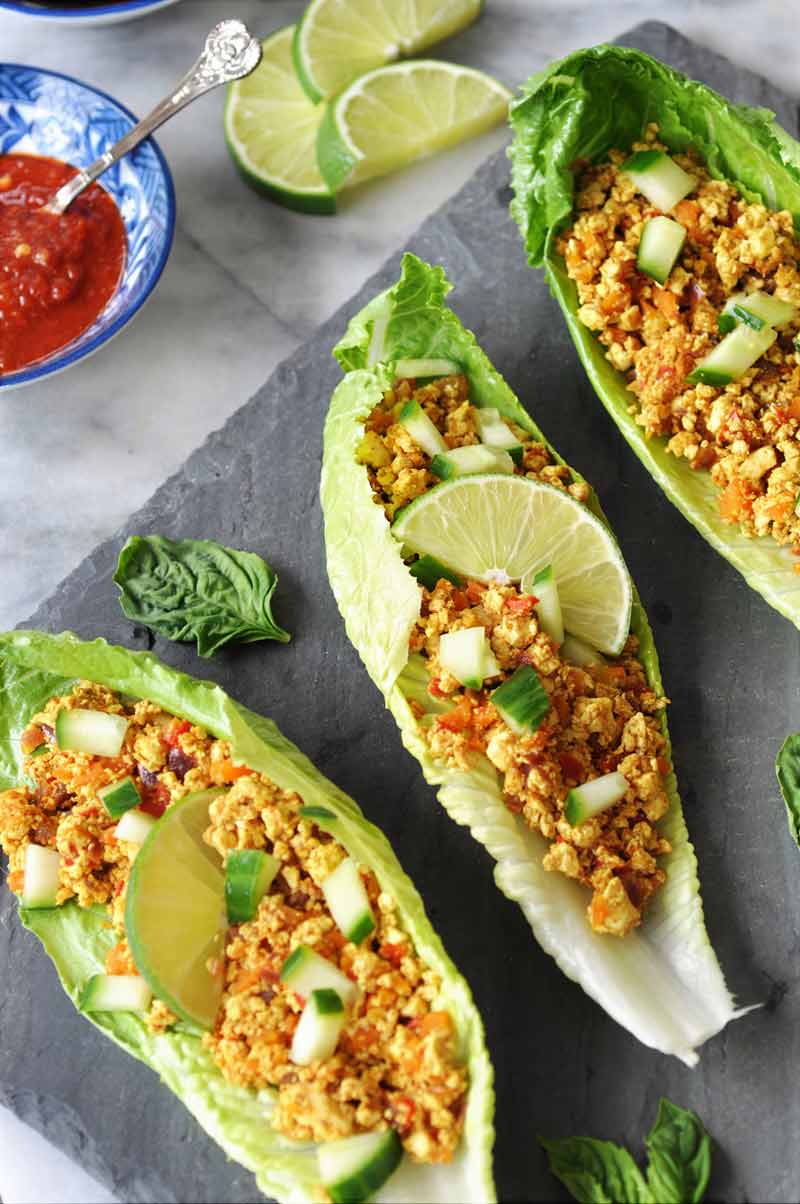 Spicy Sofritas Tofu Lettuce Wraps! This spicy tofu lettuce wrap recipe is perfect for a busy weeknight. Filled with protein, veggies, and lots of flavor. www.veganosity.com