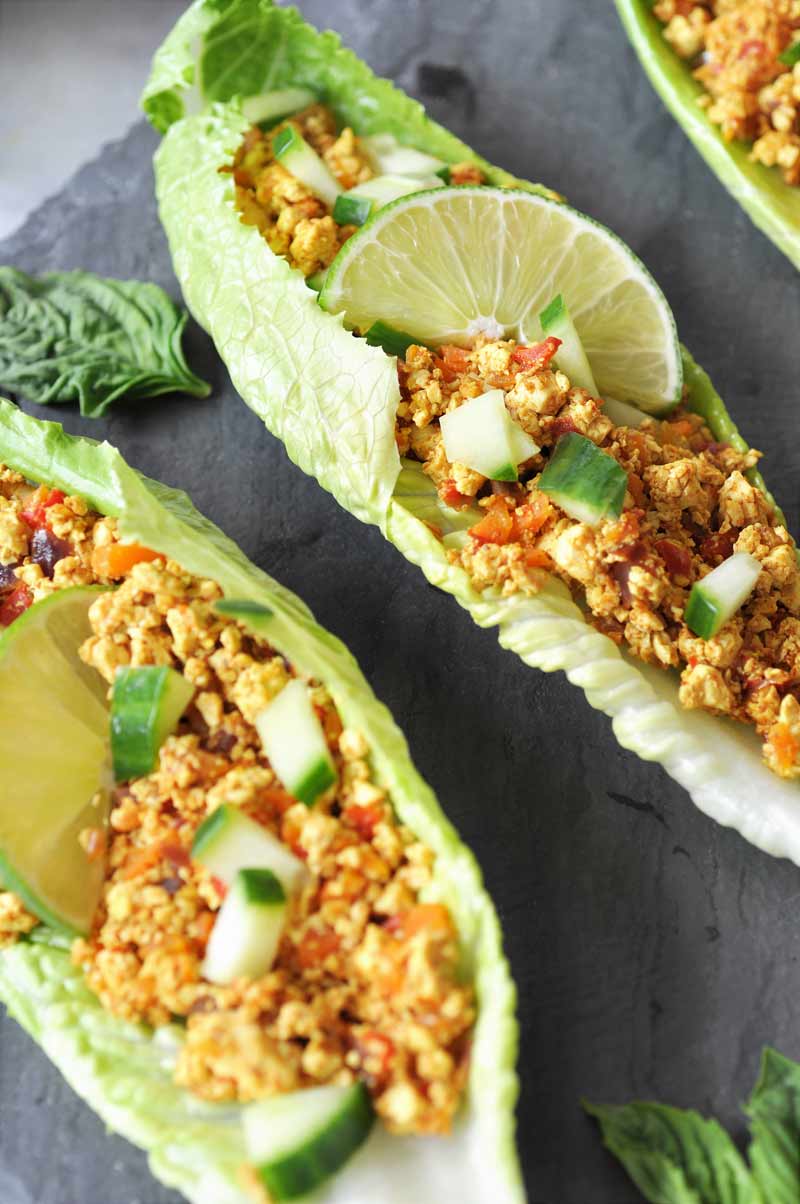 Spicy Sofritas Tofu Lettuce Wraps! This spicy tofu lettuce wrap recipe is perfect for a busy weeknight. Filled with protein, veggies, and lots of flavor. www.veganosity.com