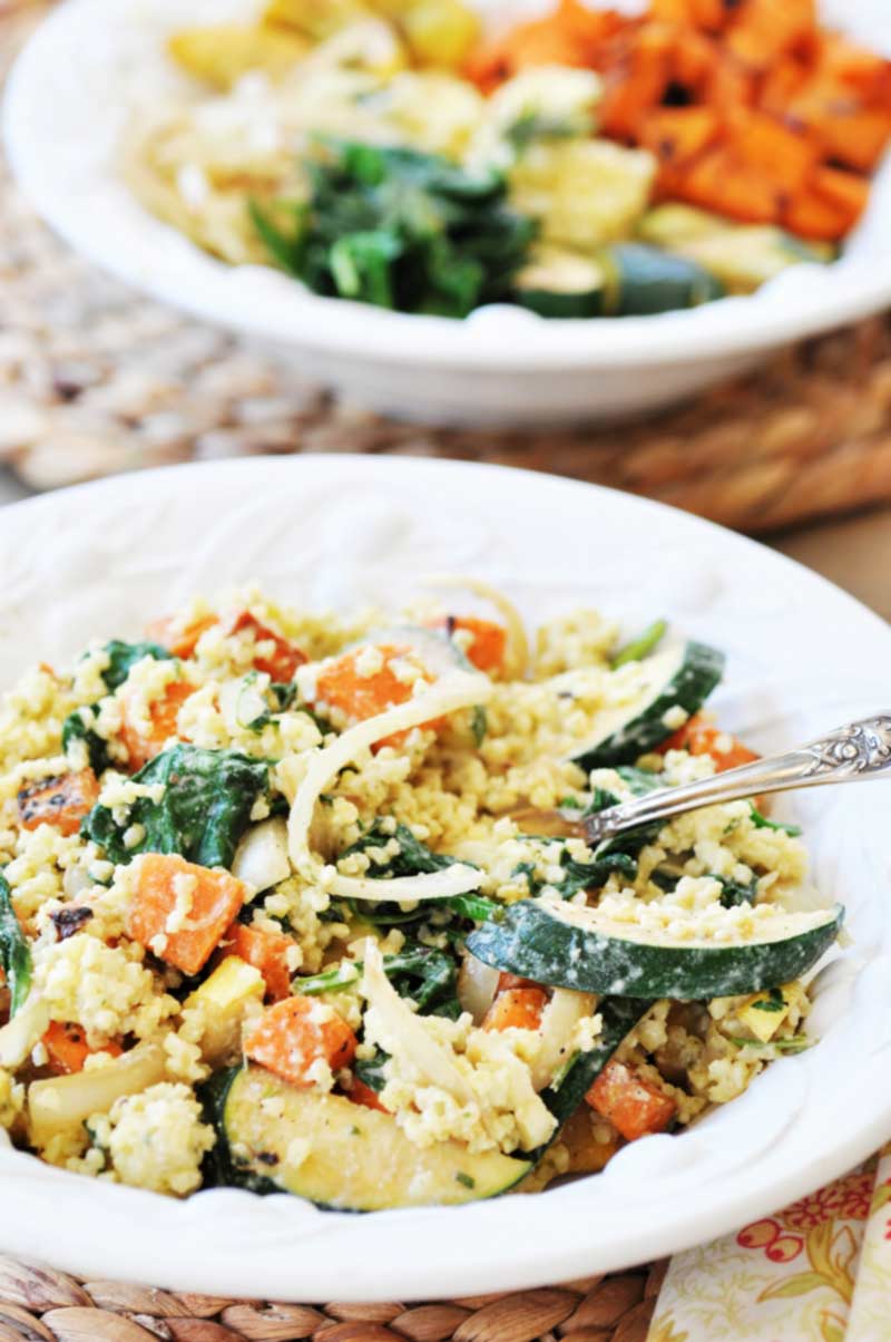 Summer Squash Buddha Bowl with Orange Ginger Dressing! This delicious and healthy Buddha bowl recipe is filled with superfoods and the most delicious creamy ginger orange dressing. It's a new family favorite. www.veganosity.com
