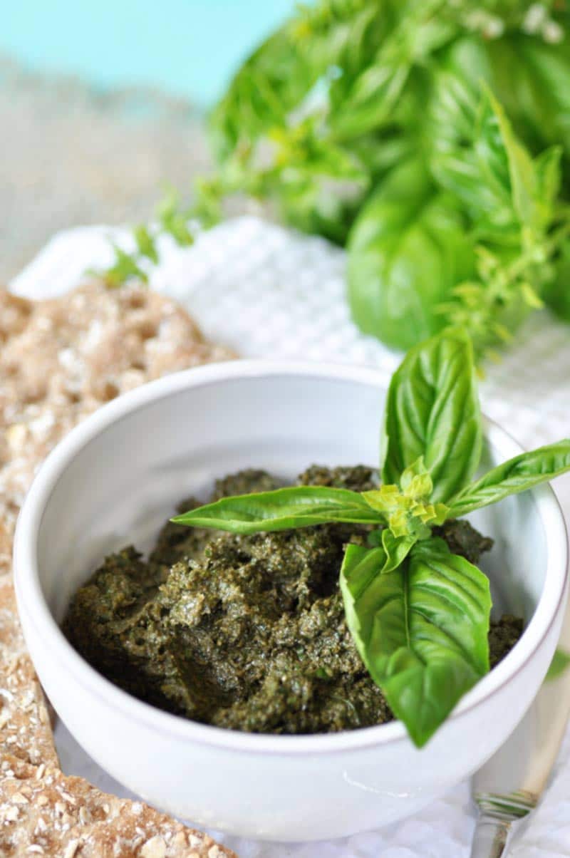 This classic vegan walnut pesto recipe is so easy and fast to make. The fresh basil and walnuts come together to make the perfect dip, spread, or sauce. www.veganosity.com
