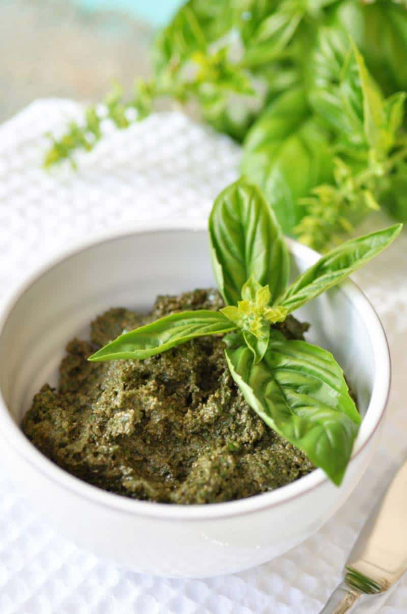 This classic vegan walnut pesto recipe is so easy and fast to make. The fresh basil and walnuts come together to make the perfect dip, spread, or sauce. www.veganosity.com