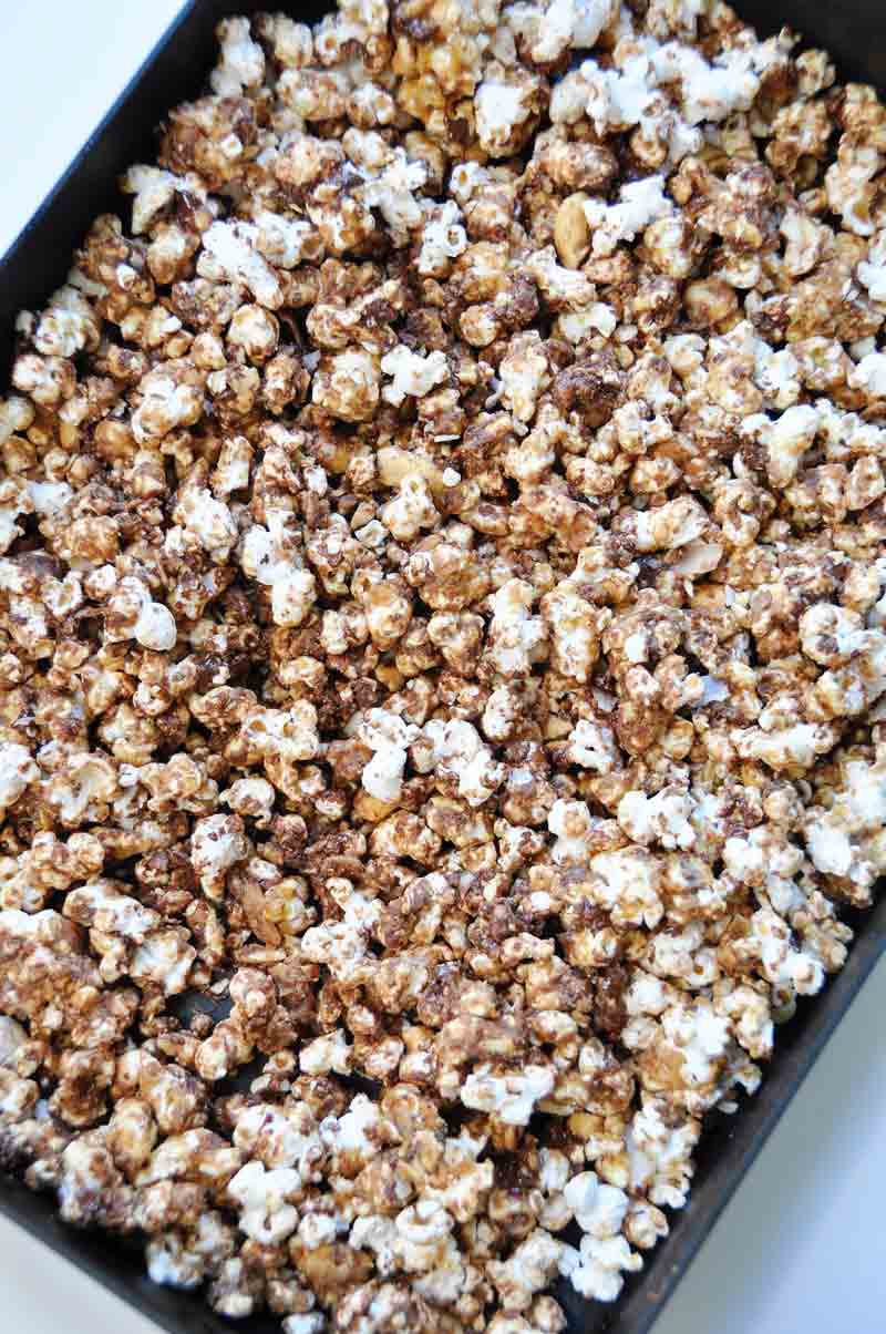 Air popped popcorn blended with peanut butter, chocolate, cashews, and coconut! The perfect snack! www.veganosity.com