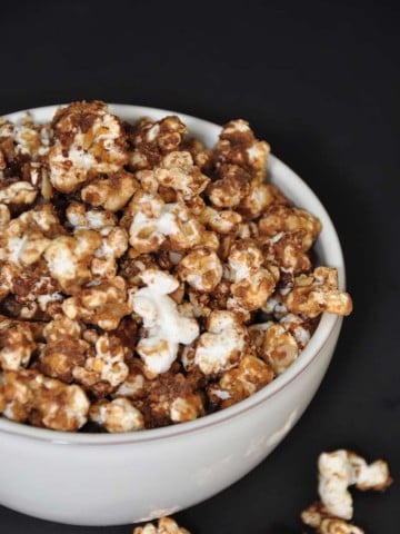 Air popped popcorn blended with peanut butter, chocolate, cashews, and coconut! The perfect snack! www.veganosity.com