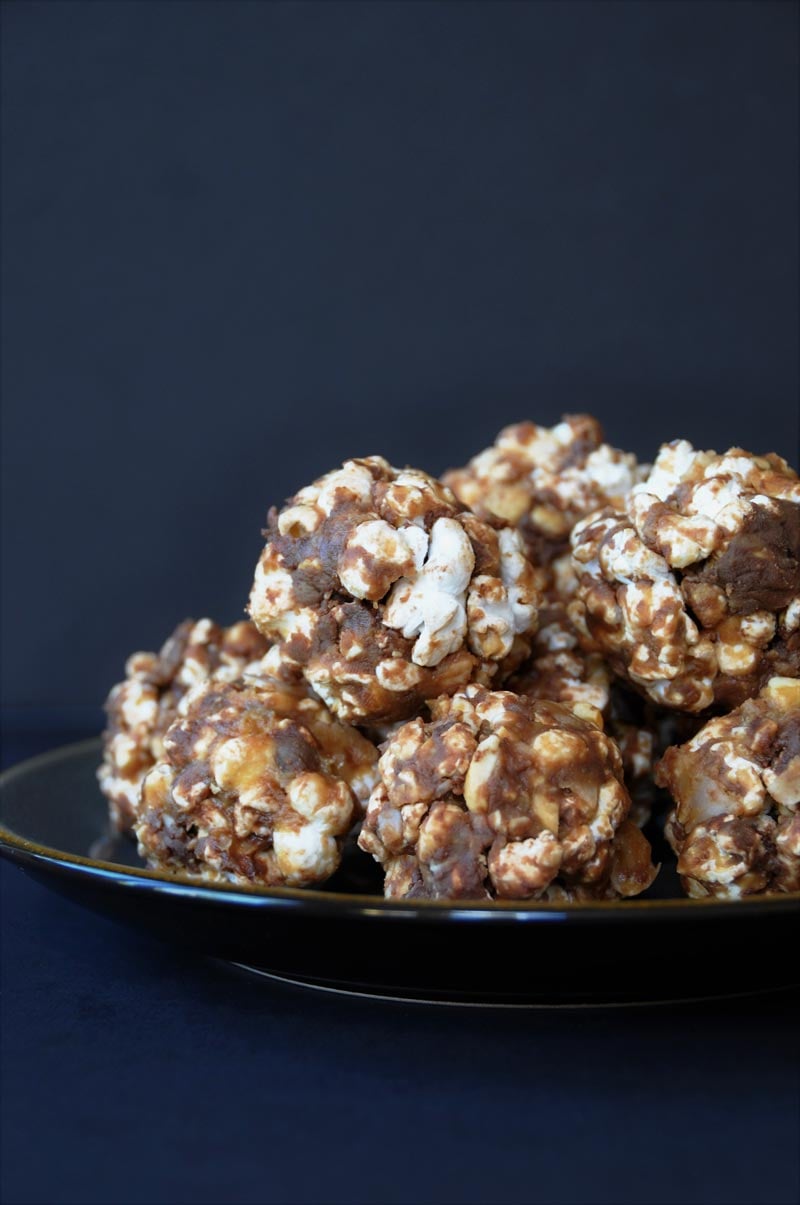 Air popped popcorn blended with peanut butter, chocolate, cashews, and coconut! The perfect snack! www.veganosity.com