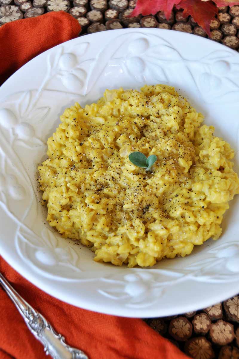 Creamy pumpkin sage cream sauce in chewy risotto. The ultimate comfort food recipe! www.veganosity.com