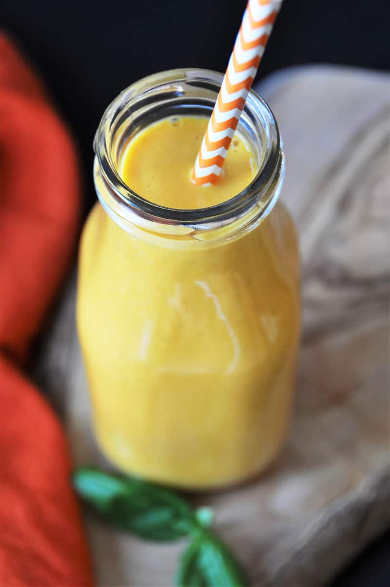 A delicious, creamy, antioxidant filled vegan smoothie recipe with carrots, turmeric, and ginger! So healthy! www.veganosity.com