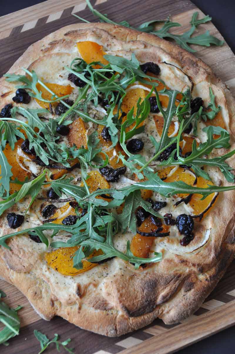 Butternut squash and vegan almond ricotta pizza! A delicious whole food plant-based healthier fall and winter vegetable pizza.