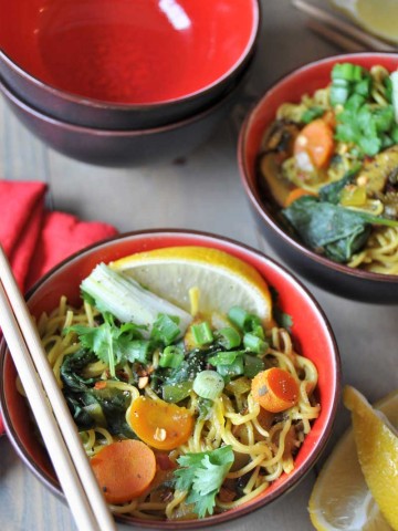 Vegan & Gluten-Free ramen noodle soup filled with delicious flavors and veggies! So healthy with anti-inflammatory turmeric and ginger! www.veganosity.com