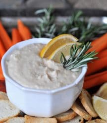 Tangy and bright lemon with savory rosemary and creamy white beans. The perfect vegan appetizer dip!