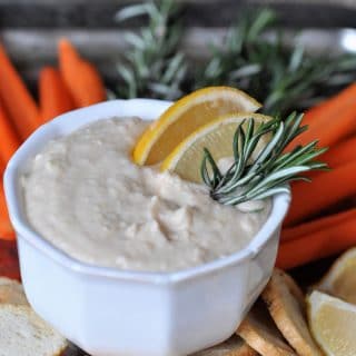 Tangy and bright lemon with savory rosemary and creamy white beans. The perfect vegan appetizer dip!