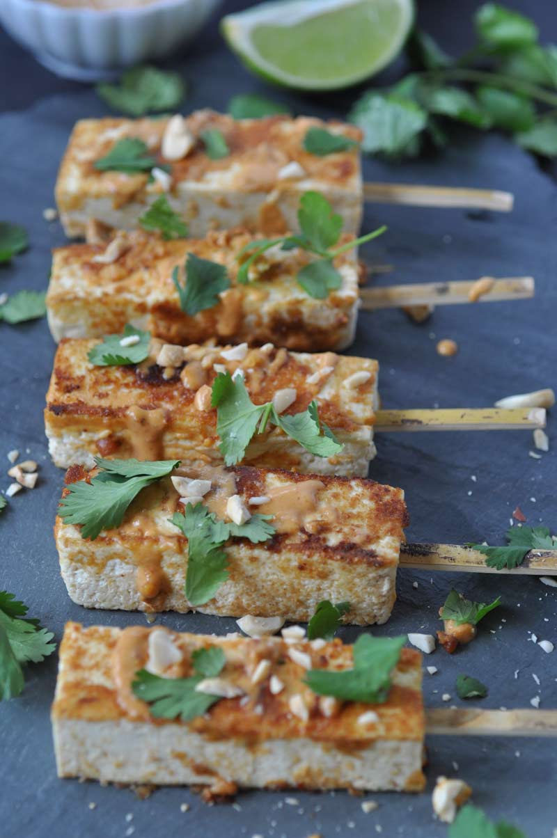 Vegan Peanut Sriracha Glazed Tofu Satay! An easy, quick, and healthy appetizer for your next get together.