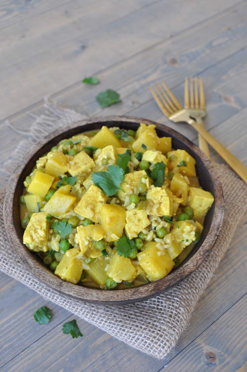 A simple and easy curry dish with tofu, pineapple, peas, and cilantro. The perfect healthy and quick dinner recipe.