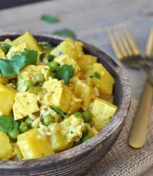 A simple and easy curry dish with tofu, pineapple, peas, and cilantro. The perfect healthy and quick dinner recipe.
