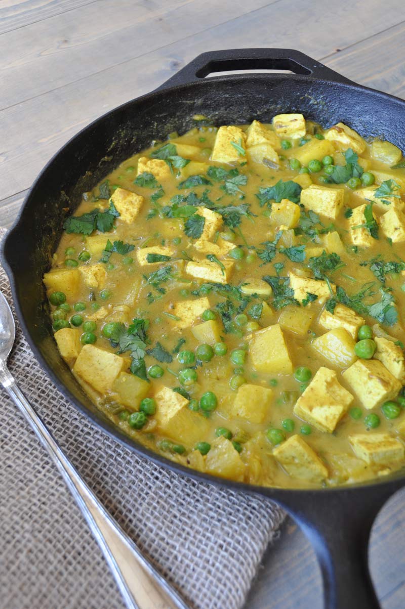 A simple and easy curry dish with tofu, pineapple, peas, and cilantro. The perfect healthy and quick dinner recipe.