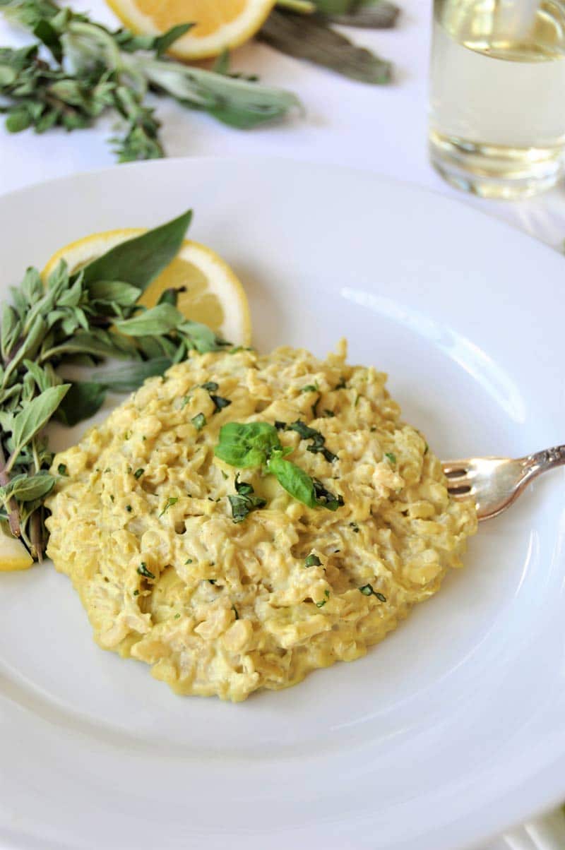 Creamy Vegan Risotto made with fresh herbs and a lemon cashew cream sauce.