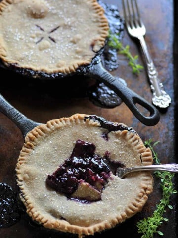 Blueberry Thyme Skillet Pie! Made in an iron skillet for a delicious and rustic dessert.