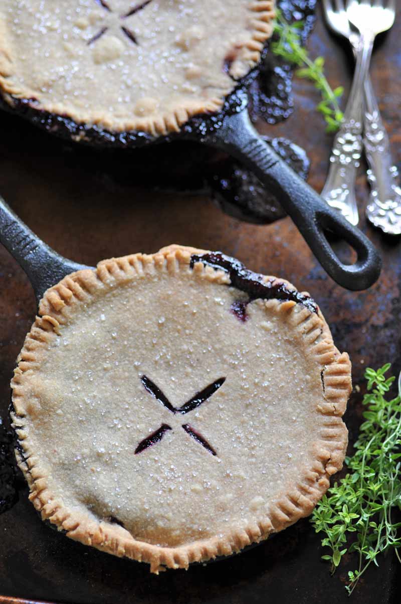 Blueberry Thyme Pie that's made in an iron skillet! An easy and delicious dessert.