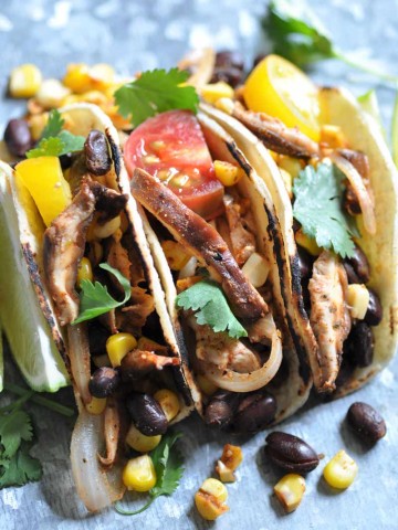 Street tacos made with black beans, corn, & shitake mushrooms. An easy appetizer or meal.