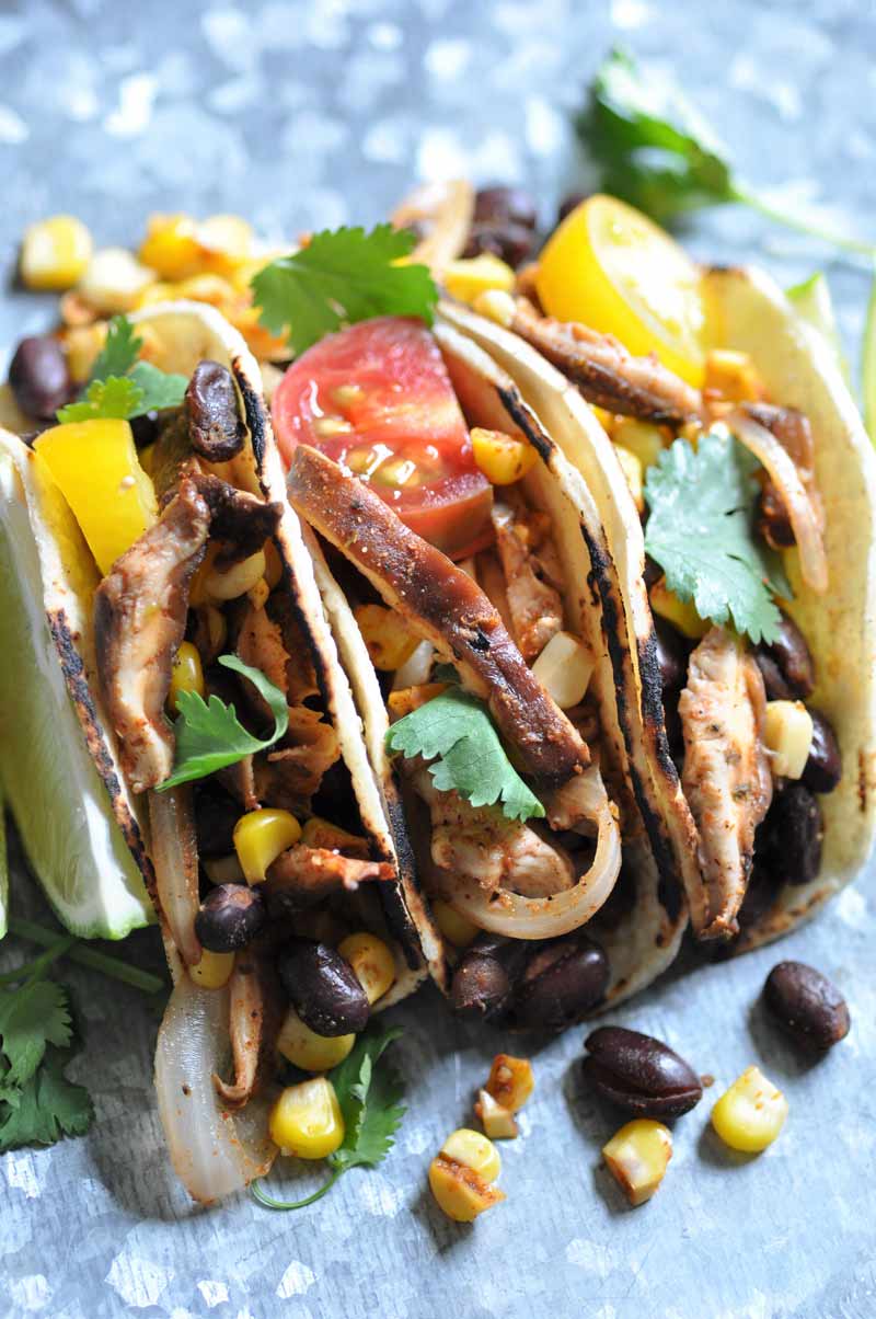 Street tacos made with black beans, corn, & shitake mushrooms. An easy appetizer or meal.
