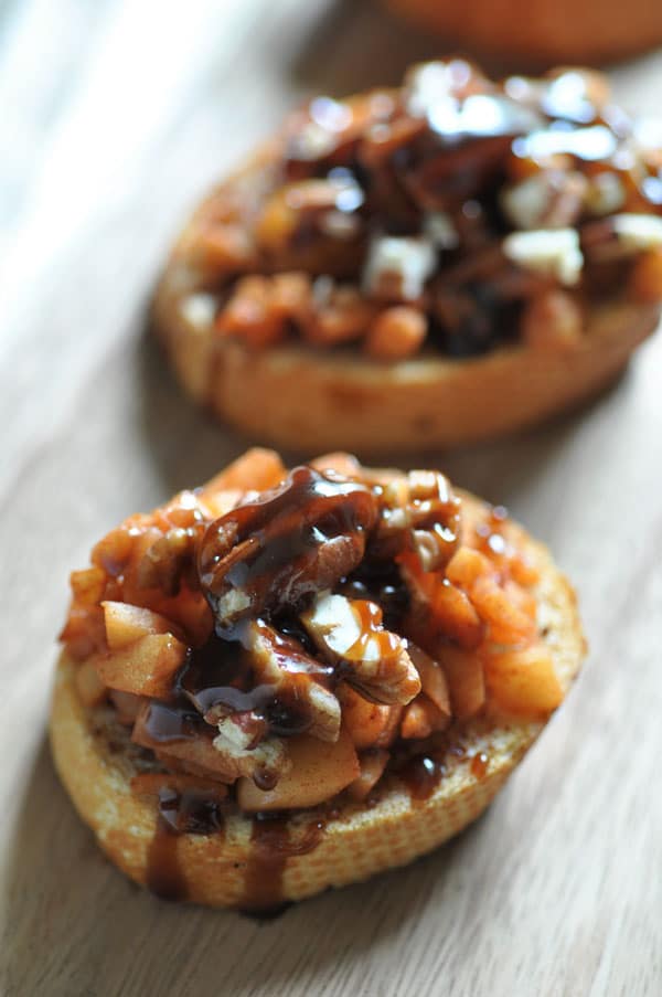 Apple Cinnamon Dessert Bruschetta lined up on a wood board