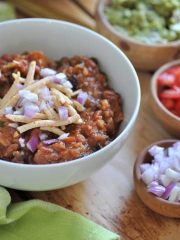Hearty veggie chili that will satisfy meat eaters. Vegan, easy to make, and delicious!