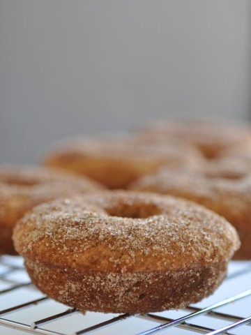 Baked apple cider doughnuts that are vegan! Made with aquafaba and so delicious!