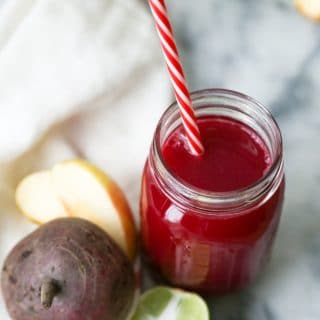Beet Juice with ingredients next to the mason jar