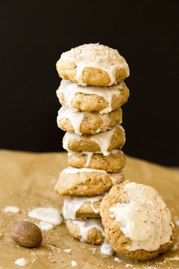 cookies stacked with frosting and shaved nutmeg