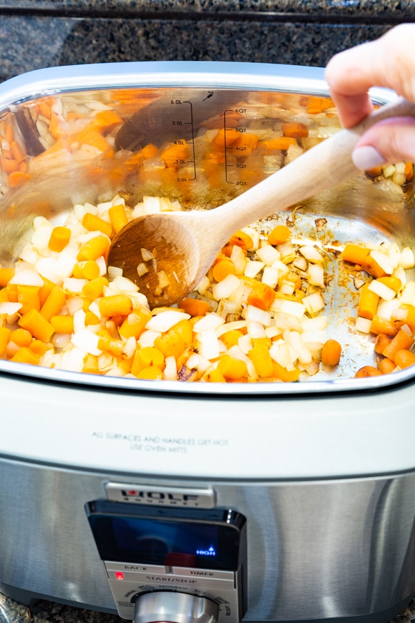 Sauteing carrots and onions in a Wolf Gourmet Multi-Function Cooker
