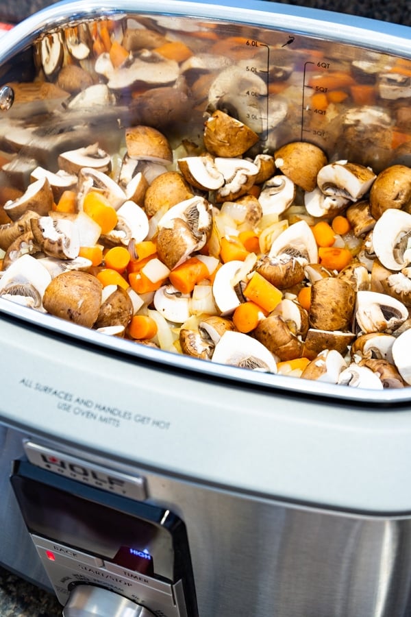 Cooking onions, carrots, and mushrooms in a Wolf Multi-Function Cooker