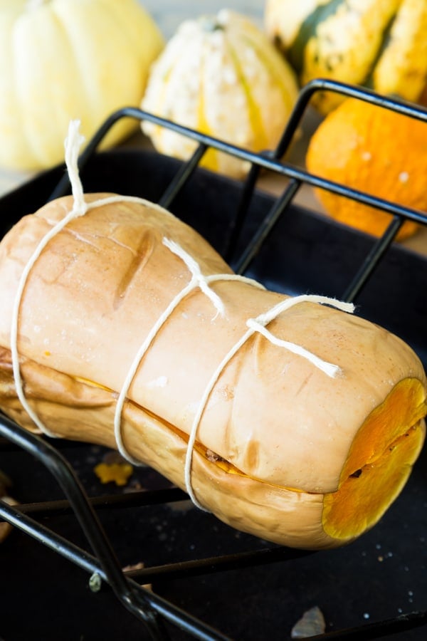 stuffed butternut squash tied together with twine