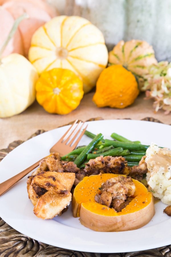 Stuffed squash served with mashed potatoes, gravy, green beans, and our stuffed wontons