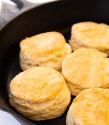 A cast-iron skillet with homemade biscuits