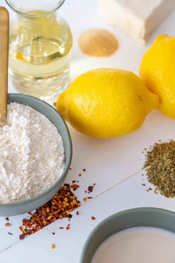 Ingredients for a roux, lemon, flour, butter, wine, spices.